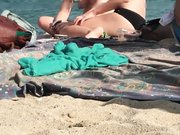 Hidden camera filming topless girls at the beach