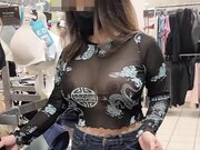 Sweet spouse with big tits wearing see through blouse in store revealing her nipples
