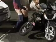 Man fucks some hoe with big fake tits and booty on a public street